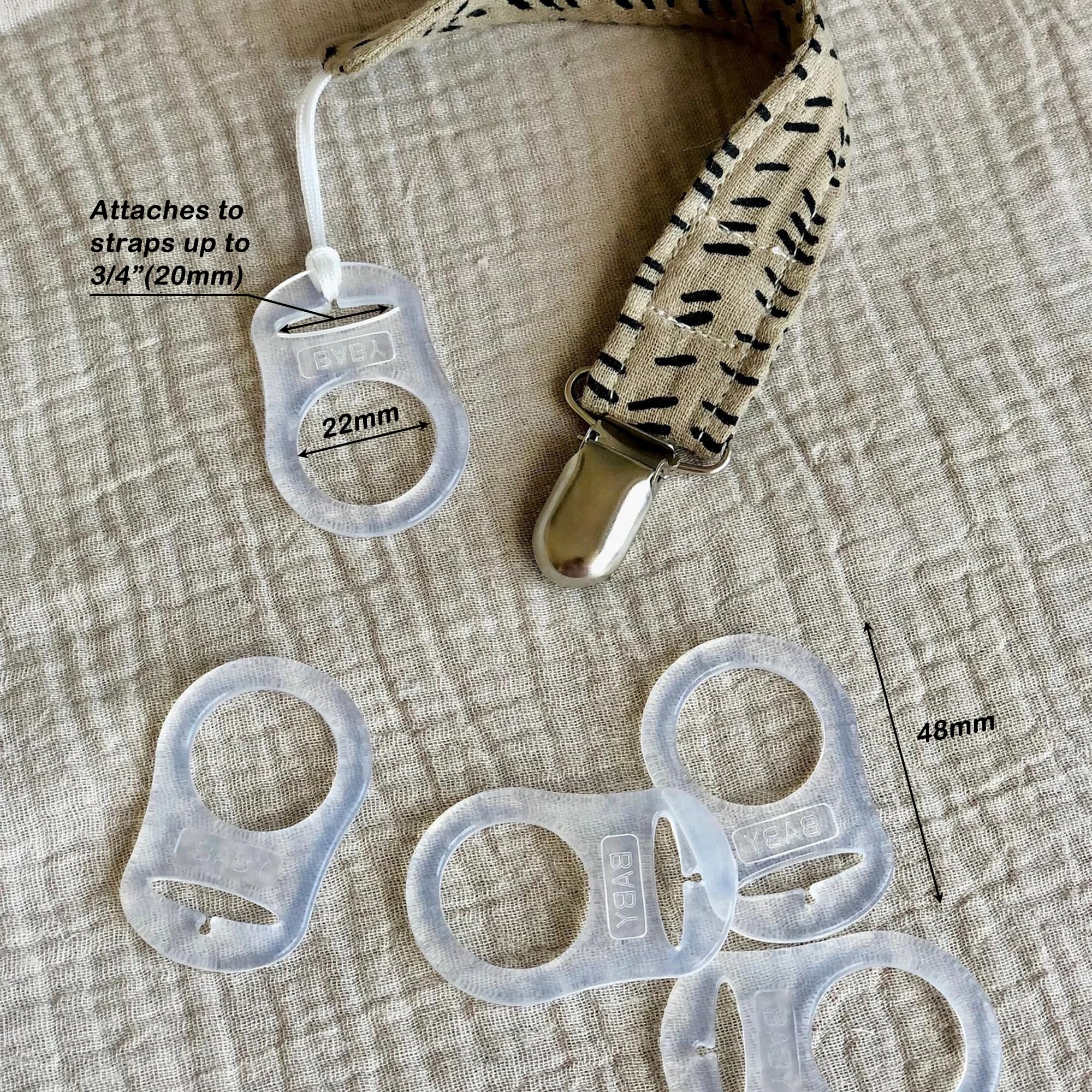 Demearly 5-pack clear pacifier adapter rings arranged for easy on-the-go replacements.