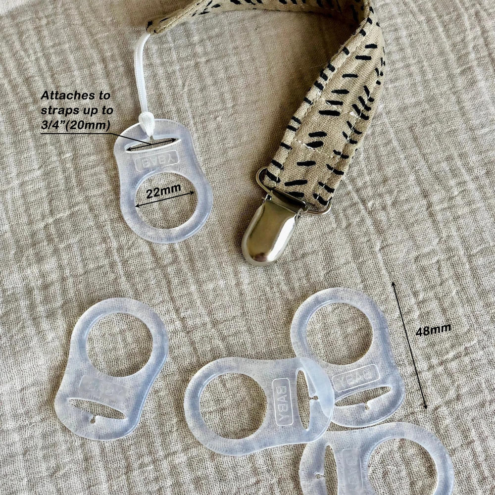 Demearly 5-pack clear pacifier adapter rings arranged for easy on-the-go replacements.