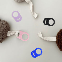 Demearly pink pack design helps keep pacifiers organized in diaper bags