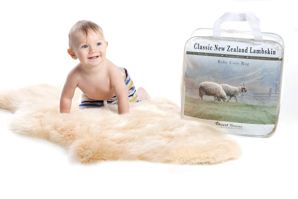 Desert Breeze Distributing New Zealand lambskin baby rug cream in crib offers plush, breathable comfort.