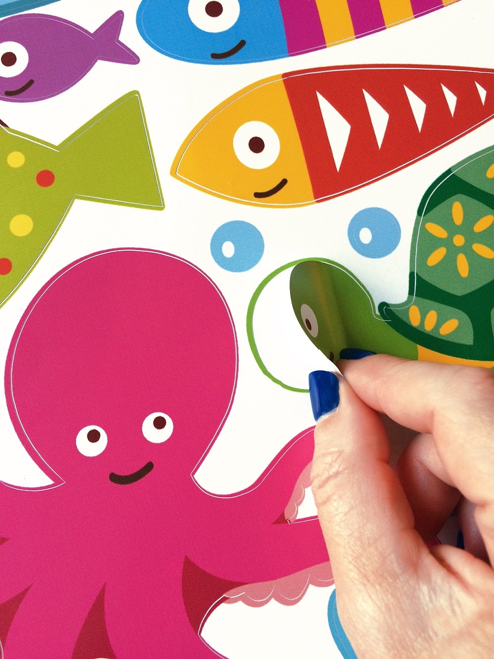 DesignStickers vinyl decals resist washing, maintaining color on bathroom walls