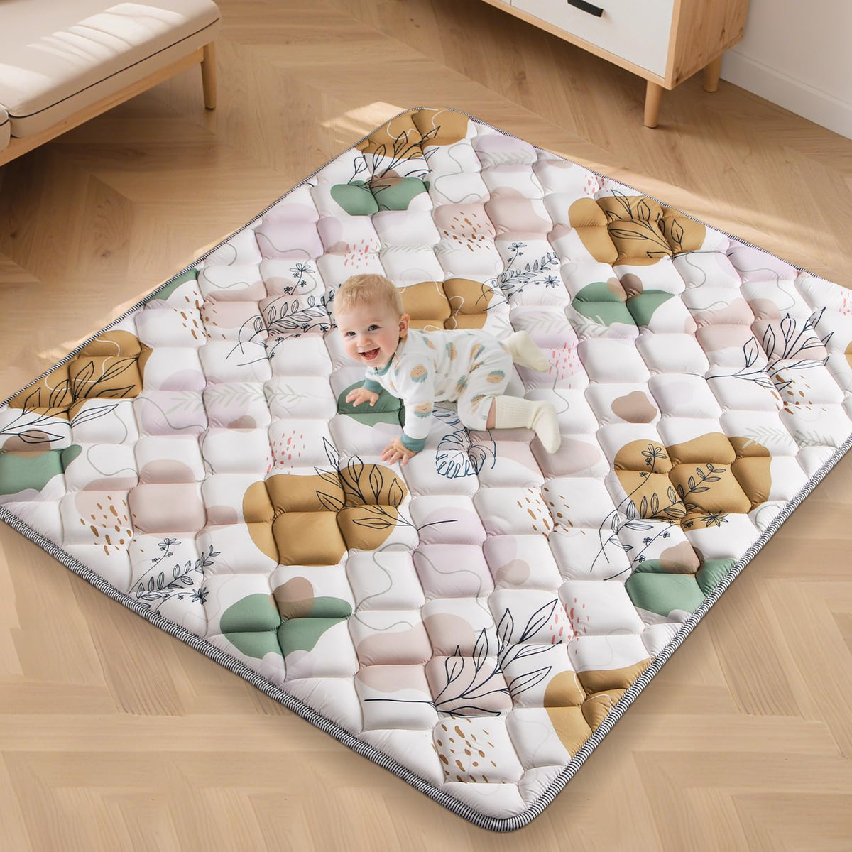 Dessports 65x50in baby play mat folded for travel and storage.