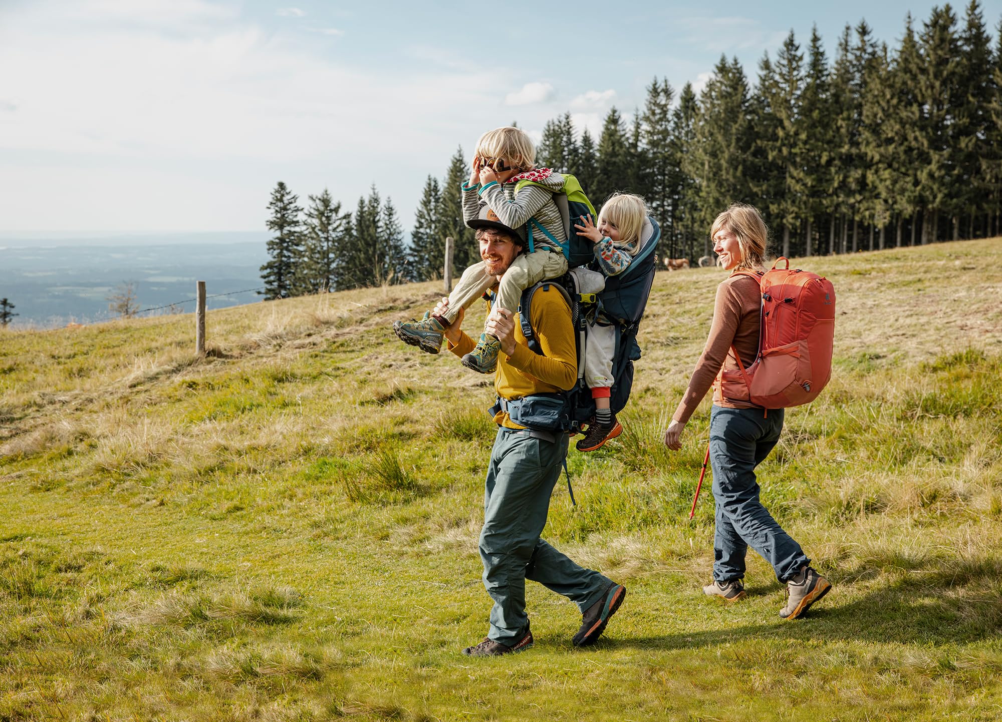 Deuter Kid Comfort Midnight on-trail view showcases durable construction for family hikes