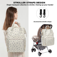 Dezcrab diaper backpack attached to a stroller with straps for hands-free travel.