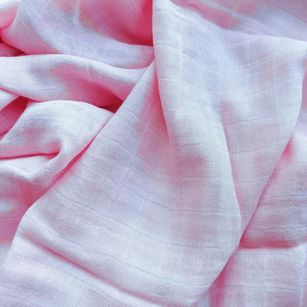 DEZIGKA muslin swaddle closeup highlighting velvety-soft fabric quality