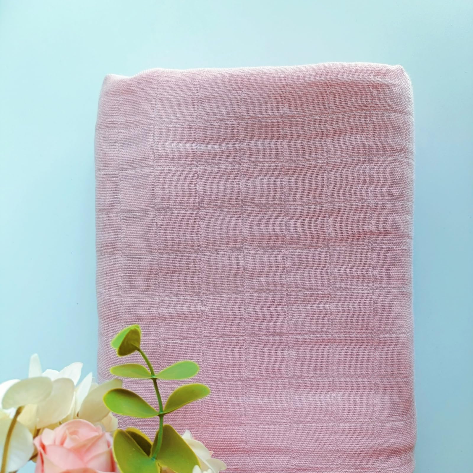 DEZIGKA muslin wrap used as nursing cover during feeding