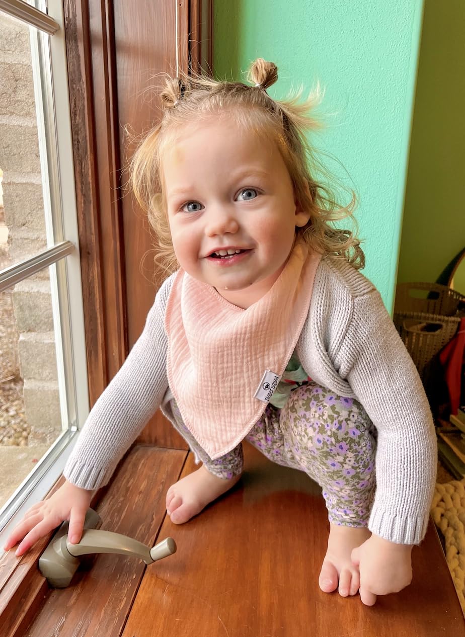 Diaper Squad bibs worn during teething show absorbent, soft fabric to protect outfits