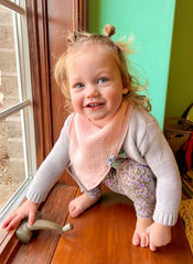 Diaper Squad bibs worn during teething show absorbent, soft fabric to protect outfits