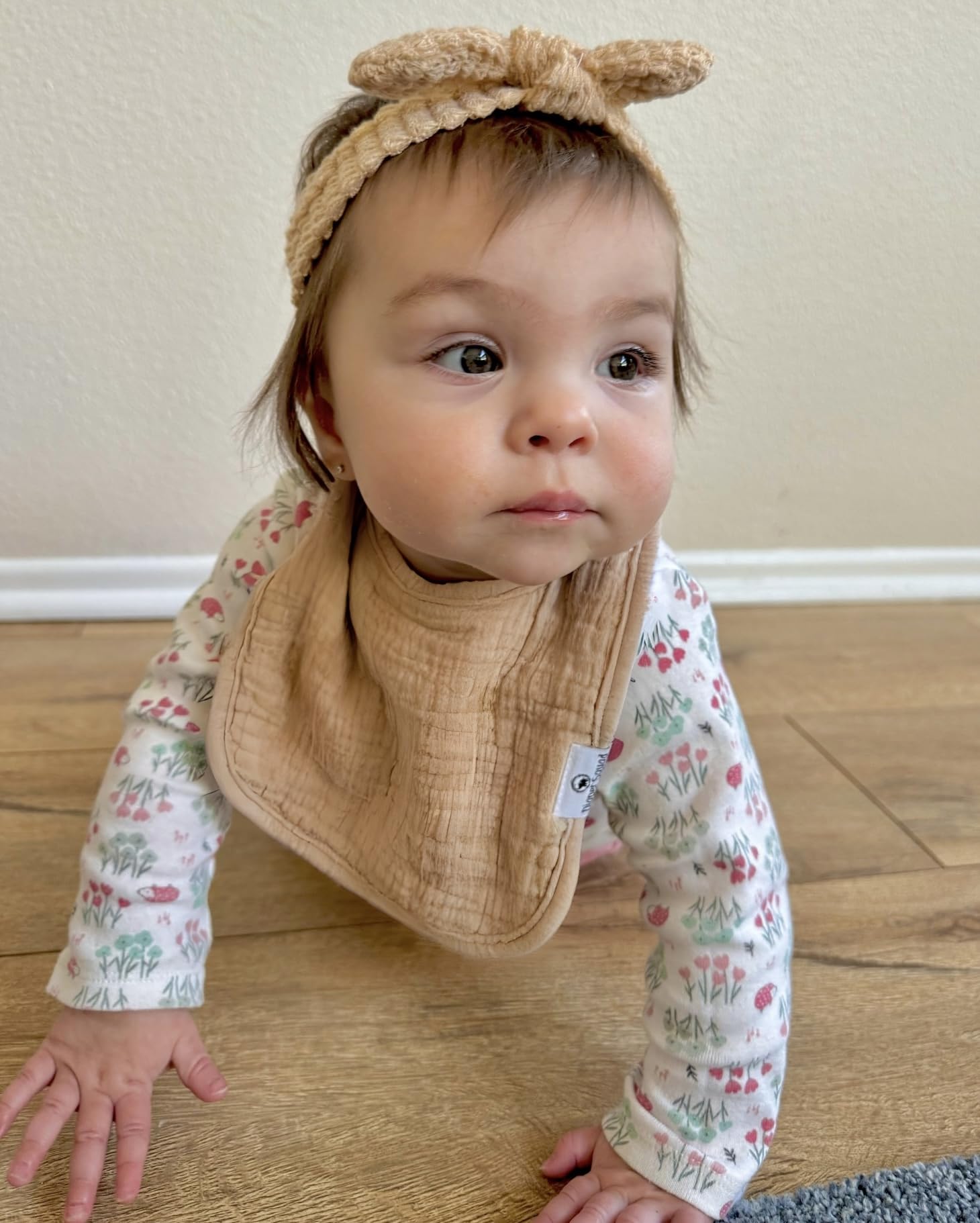 Diaper Squad teething moments captured with coordinated bibs and moisture absorption