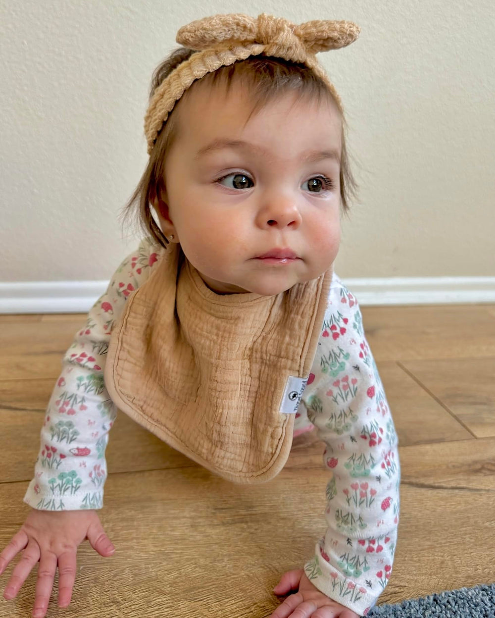 Diaper Squad teething moments captured with coordinated bibs and moisture absorption