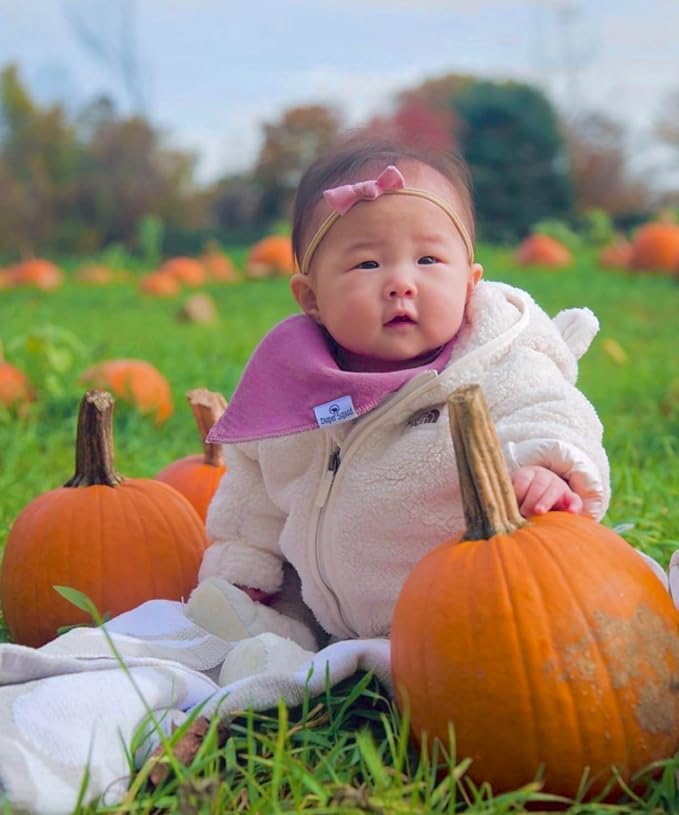 Diaper Squad baby bandana bibs showcasing stylish designs that coordinate with outfits