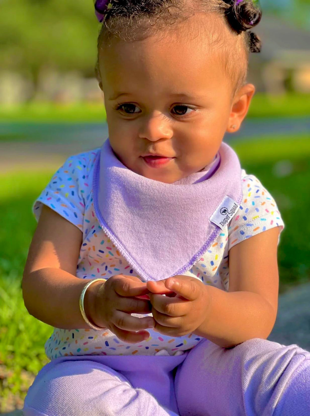 Diaper Squad bibs help protect outfits during drool sessions and teething feedings.