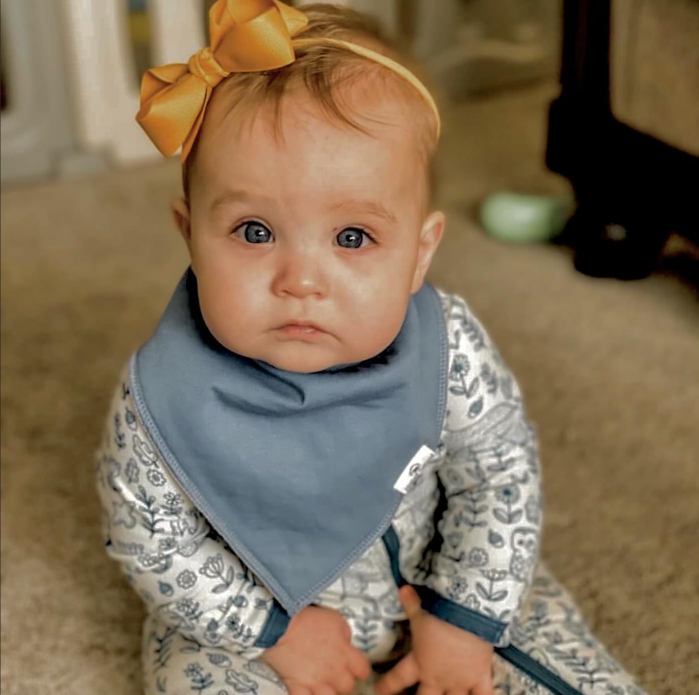 Diaper Squad gender-neutral bibs coordinate with outfits while catching drool