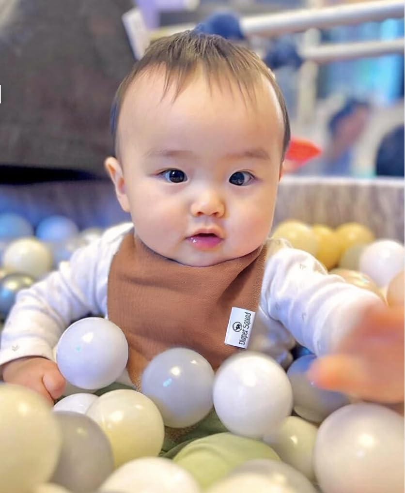 Diaper Squad machine-washable bibs; simplify daily cleanups after meals and drool.