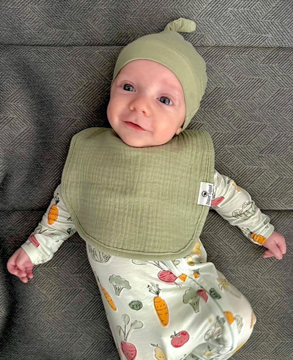 Diaper Squad machine-washable bibs for easy cold-water care.