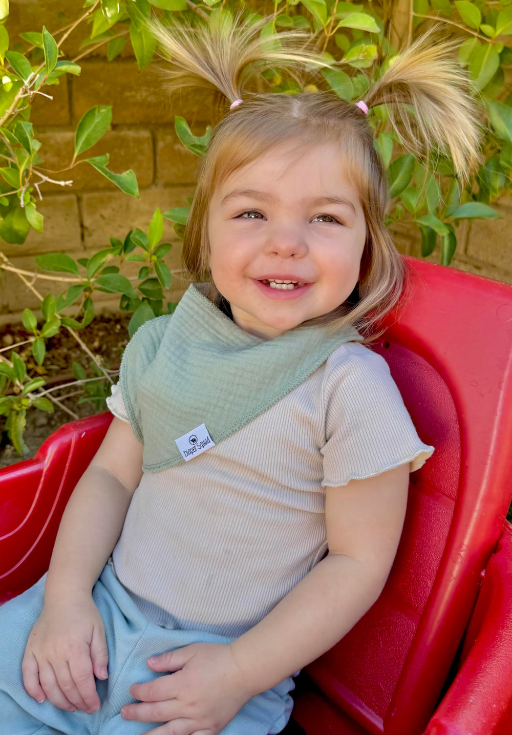 Diaper Squad machine washable bibs deliver easy daily care.