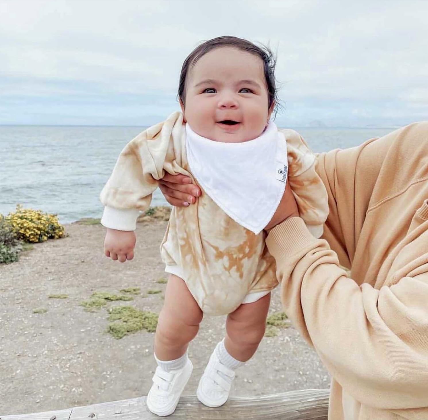 Diaper Squad machine-washable bibs simplify daily care and reuse.