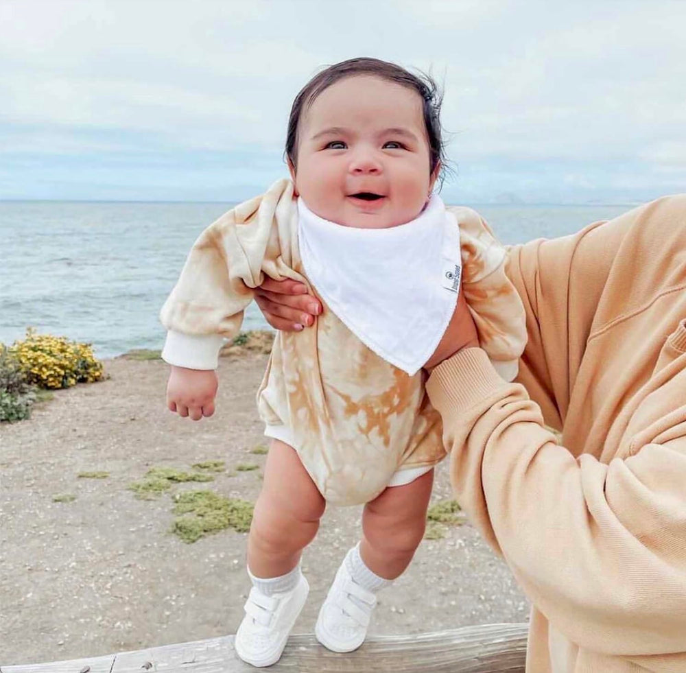 Diaper Squad machine-washable bibs simplify daily care and reuse.
