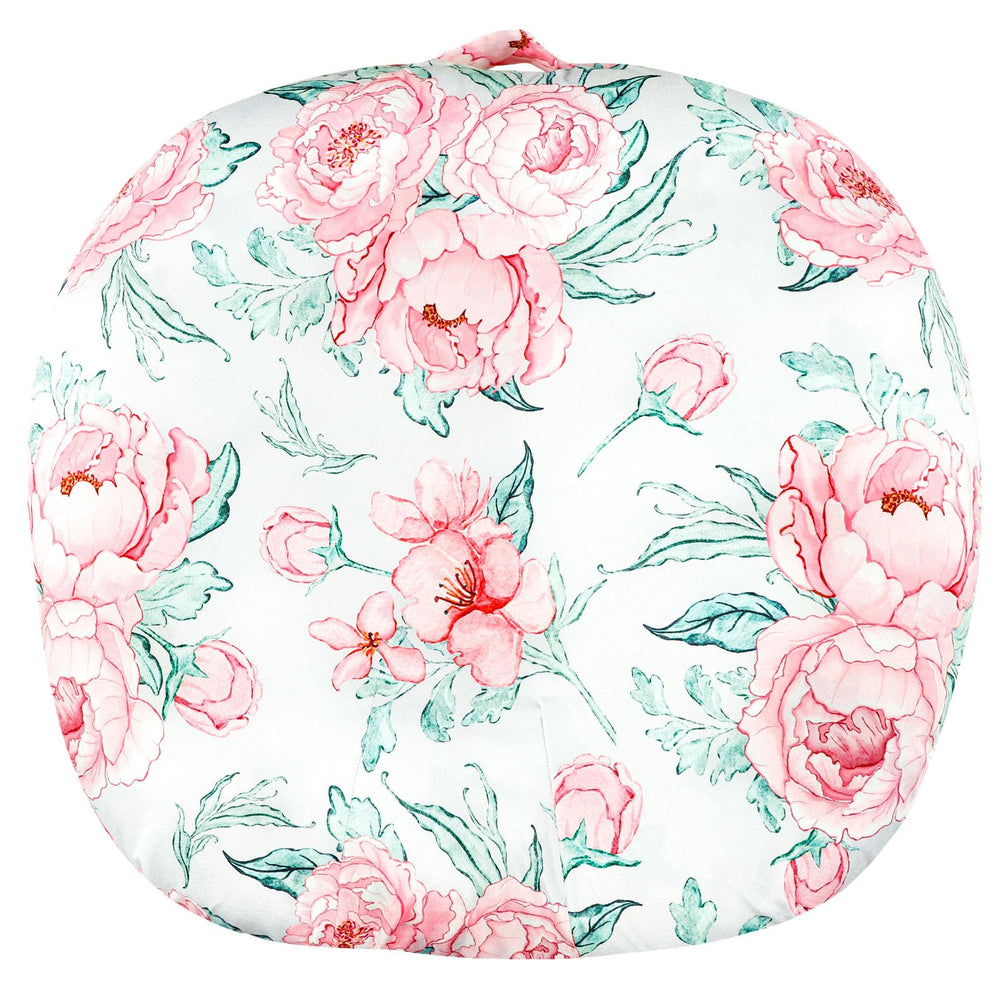 DILIMI newborn lounger cover features a floral pattern to enhance nursery style and softness.