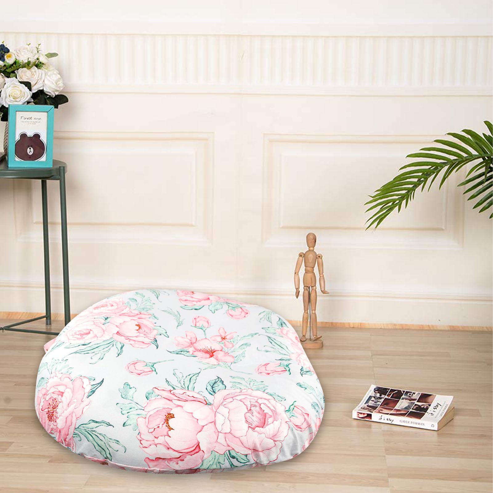 DILIMI floral lounger cover placed in a cozy nursery setting.