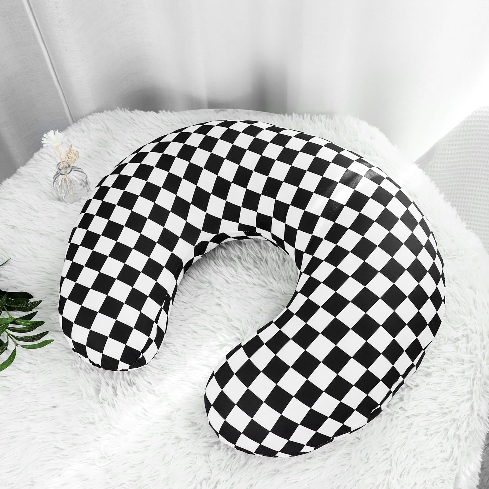 DILIMI checkerboard pattern complements modern nursery decor on bed or sofa.