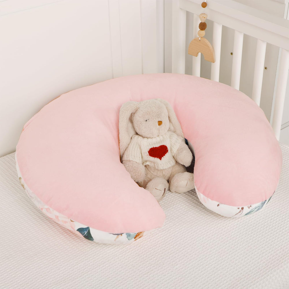DILIMI floral cover styled on a bed enhancing nursery aesthetics