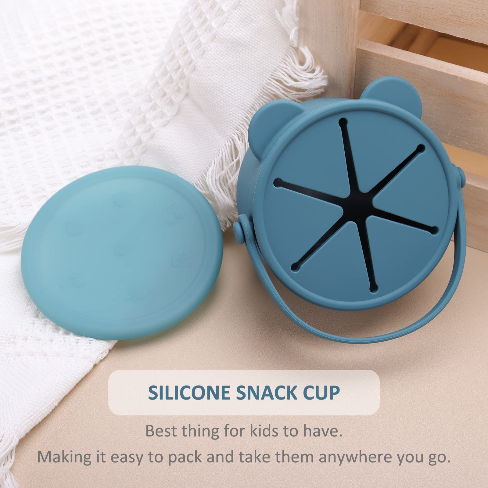 Dilovely snack cups soft-flap feature shown as teether option during playtime.