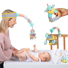 Dingle Dangle Deluxe Gift Set headband in use helps calm wriggly babies during diaper changes.