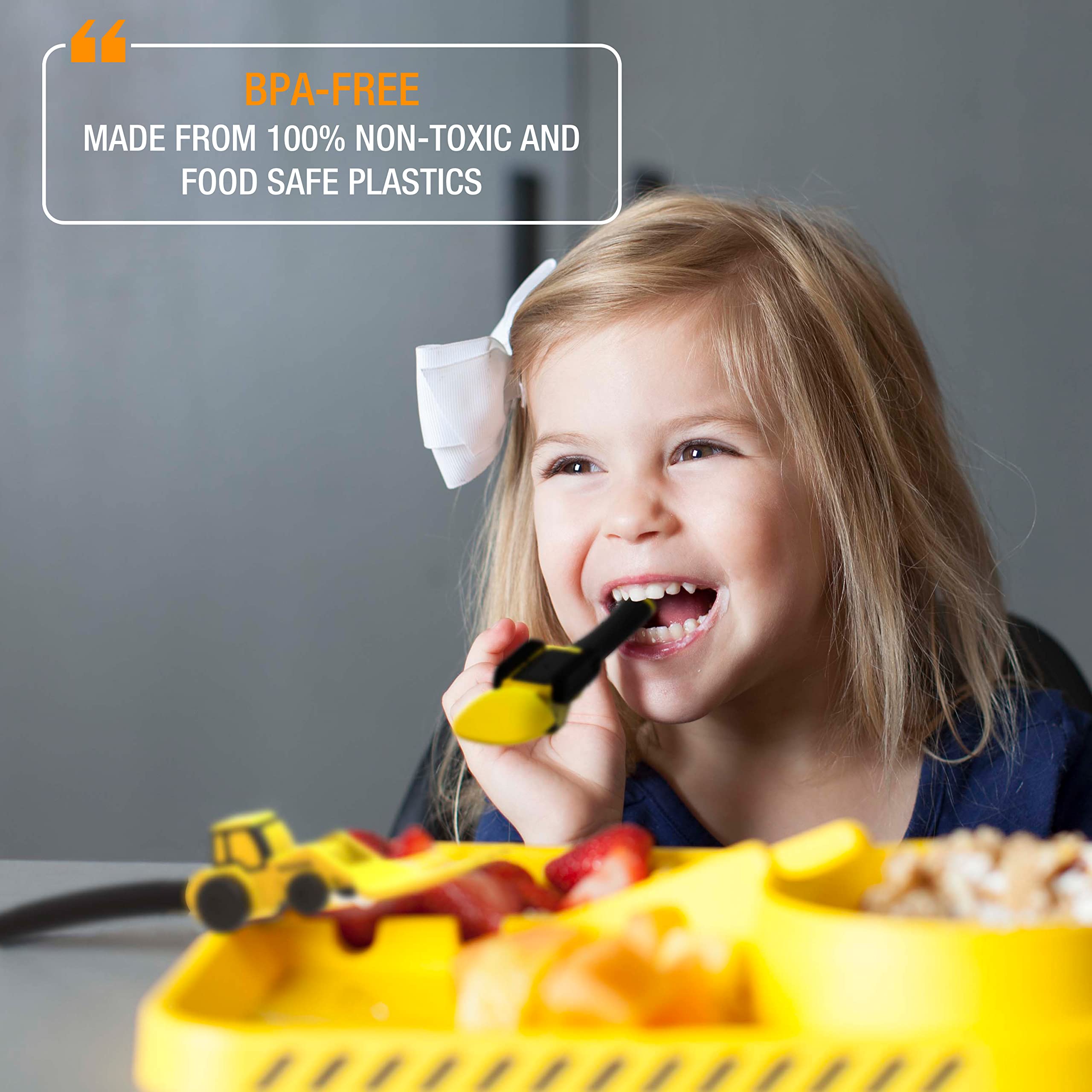 Dinneractive kids mealtime scene with construction-themed utensils
