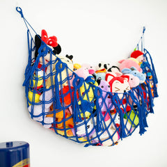Diocos boho nursery decor with tassels and wood beads in blue
