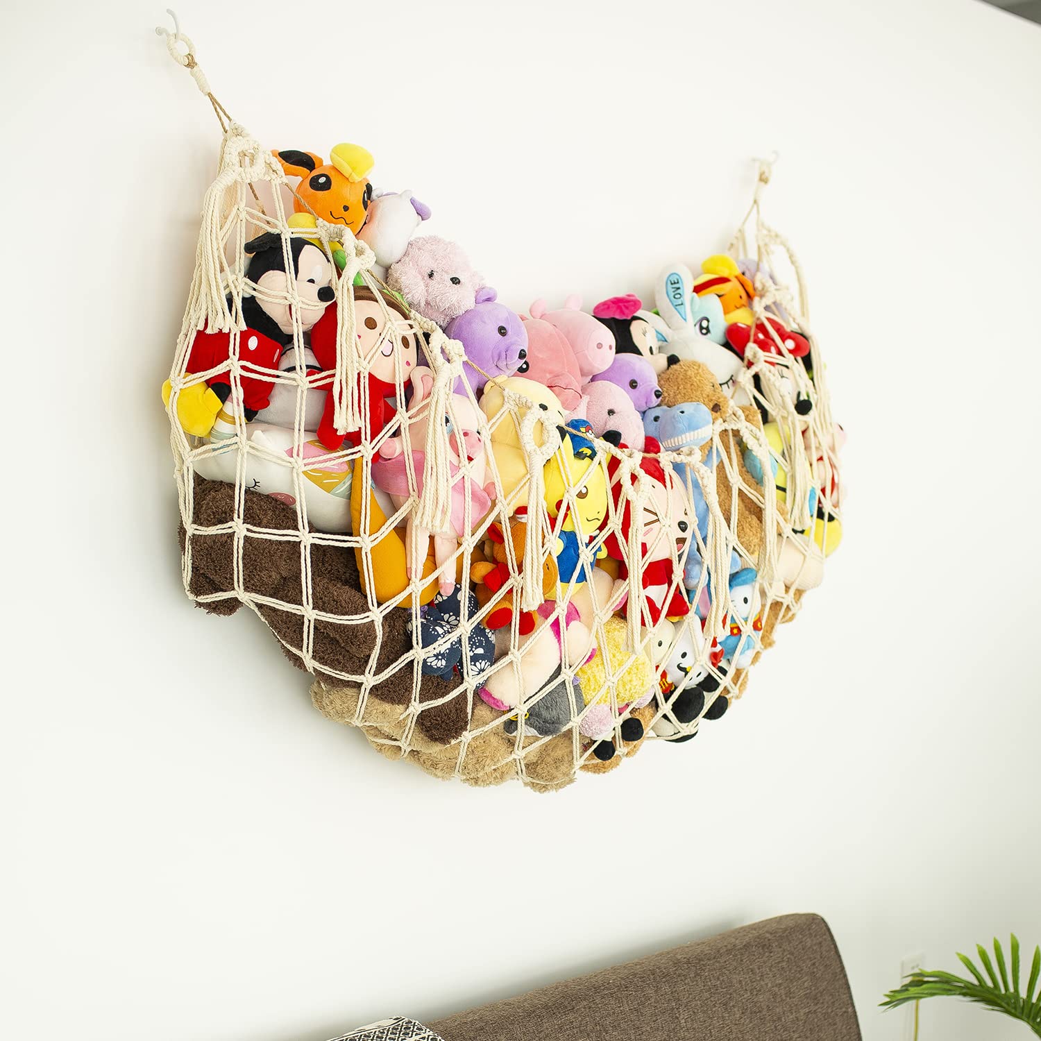 Diocos wooden beads and tassels plushie hammock adds boho style and display.