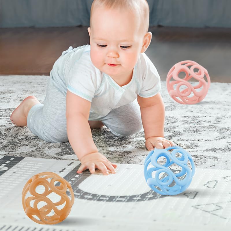 Dirbabi teether ball held by baby demonstrates easy grip design