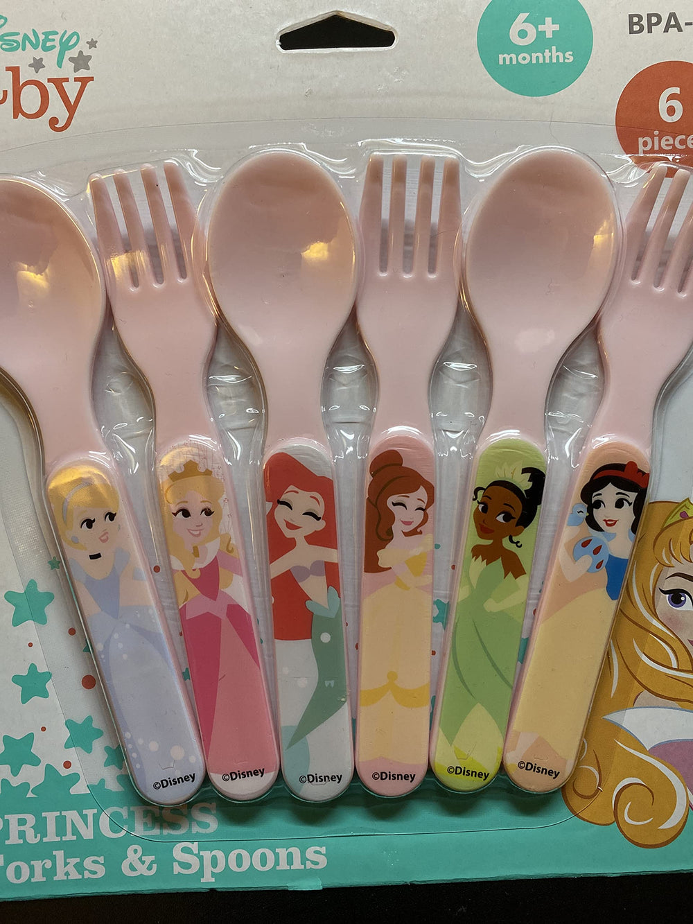 Disney Baby Princess forks and spoons on table, top-rack dishwasher safe.