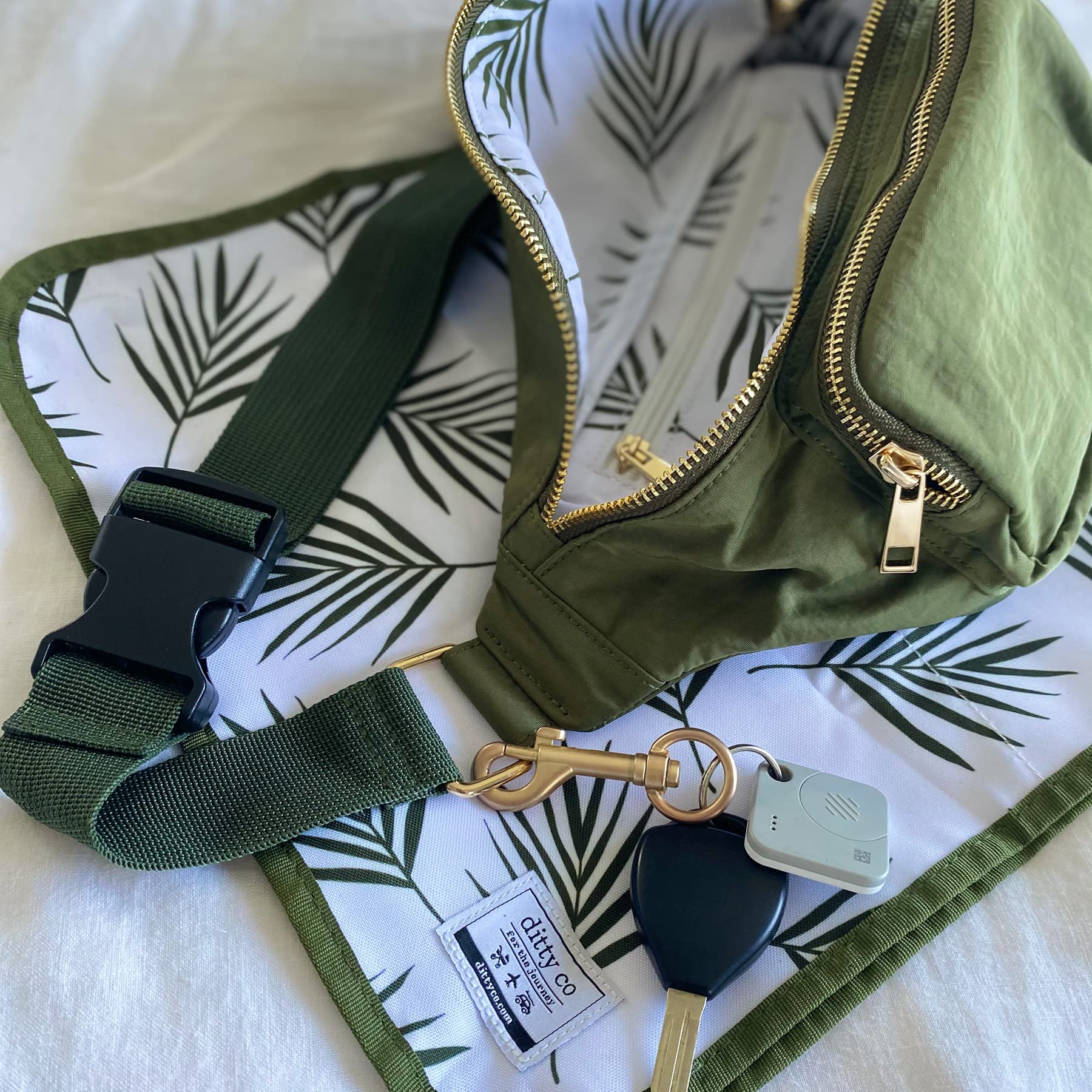 Ditty Co Lanikai olive bag side view highlighting compact crossbody design.