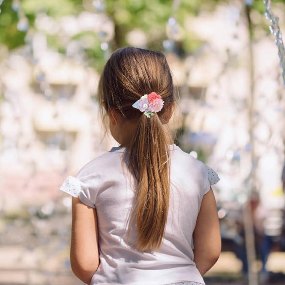 Dizila pink flower hair ties on band styled for cute pigtails