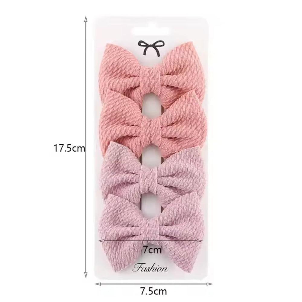 Dnett Designs 3-inch bows fit babies to older toddlers.