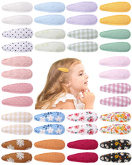 dobo i toddler hair clips closeup showing cloth-wrapped base for secure daylong wear.