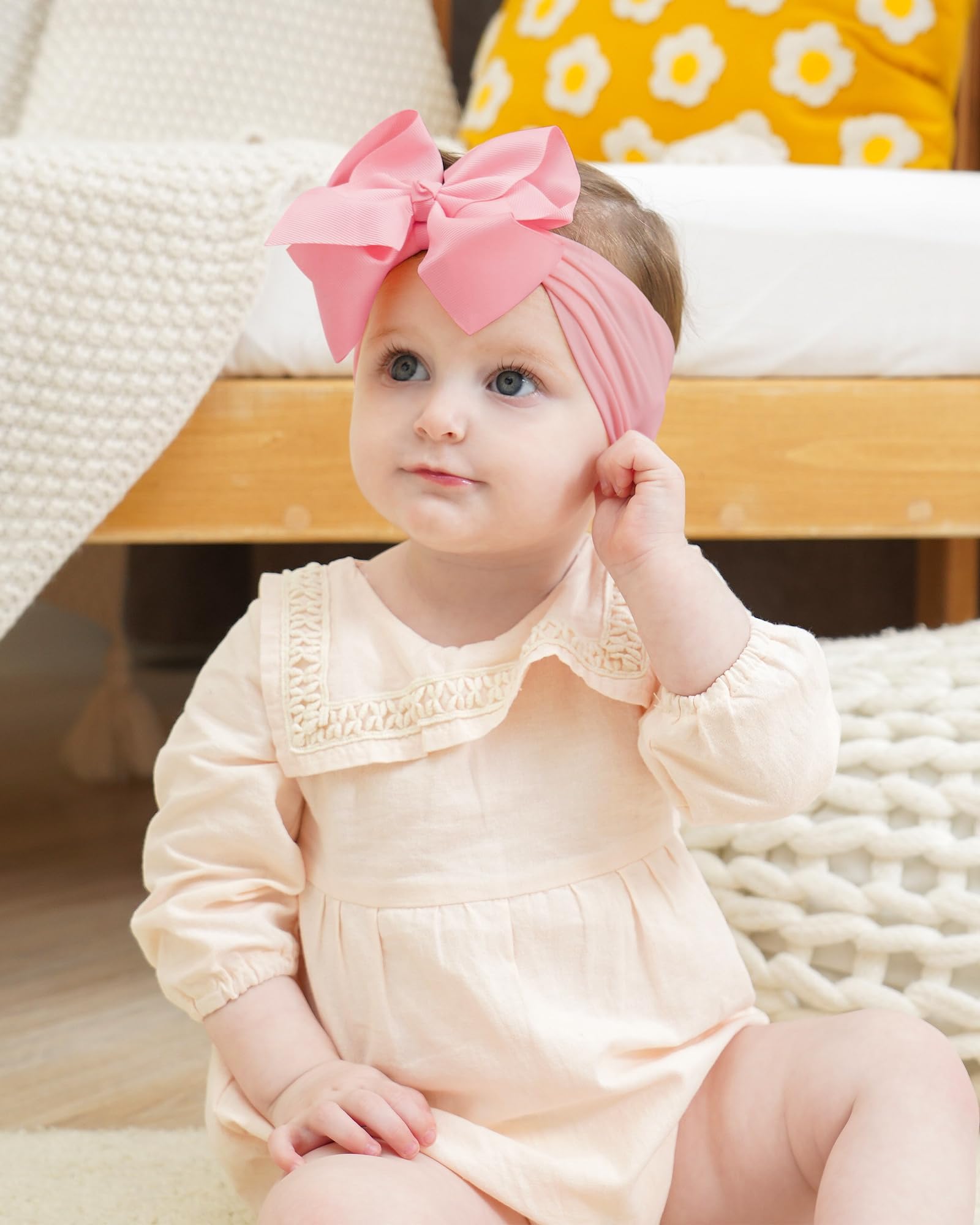 baby headband by doboi used as a photography prop for portraits