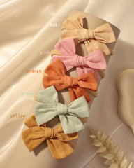 Doboi baby headbands worn in a family portrait session