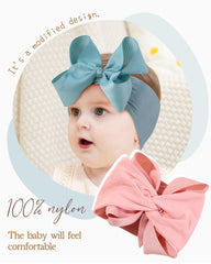 Doboi baby headbands with large ribbon bows ideal for photography sessions.