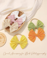 Doboi bows worn at parties or portraits elevate little outfits.