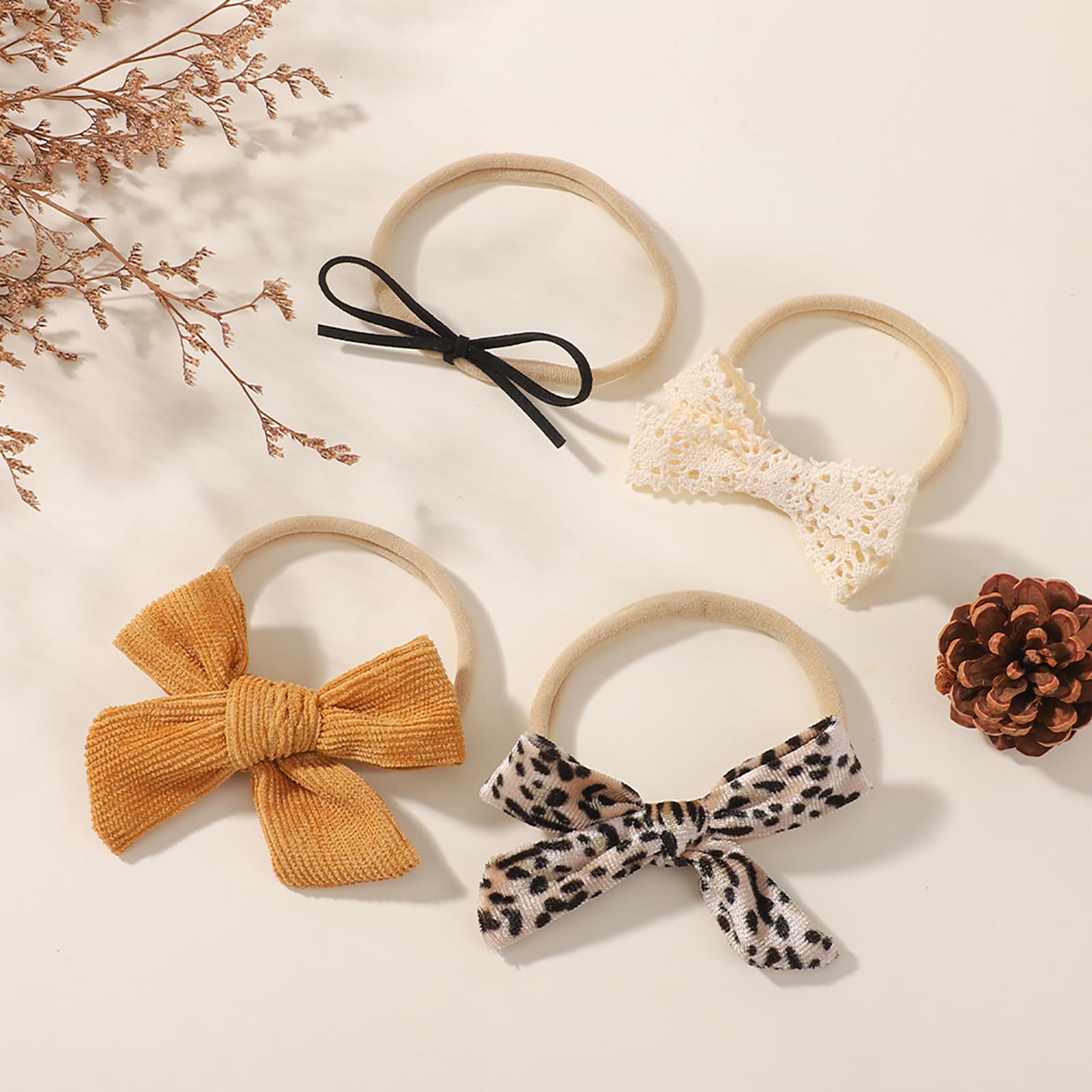 Doboi gray suede bow offers a chic, soft texture for newborn shoots.
