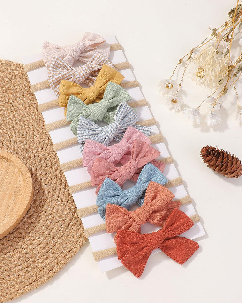 Doboi linen bows with soft nylon band offer gentle everyday wear.