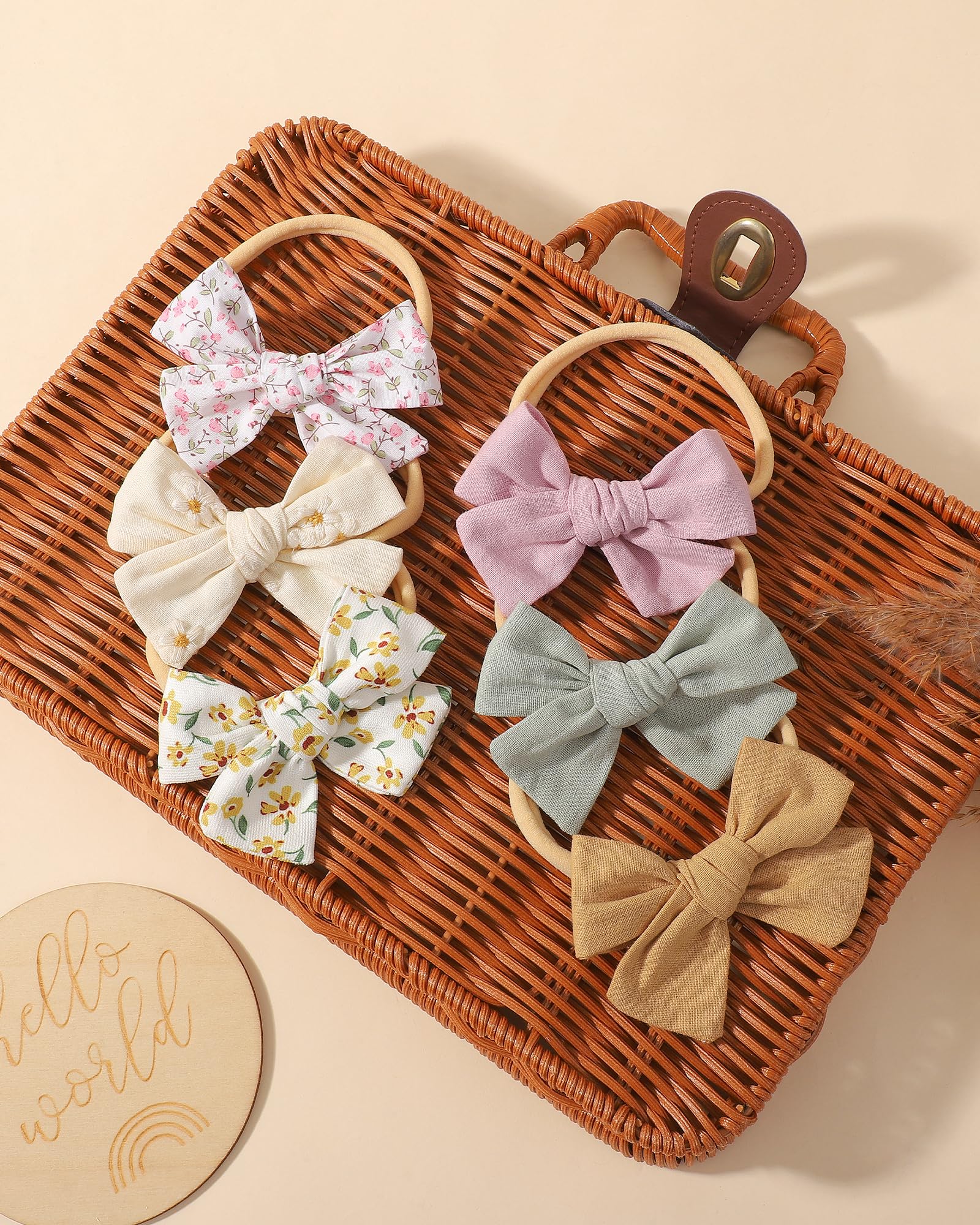 Doboi linen bow texture close-up emphasizes soft, breathable fabric for delicate heads.