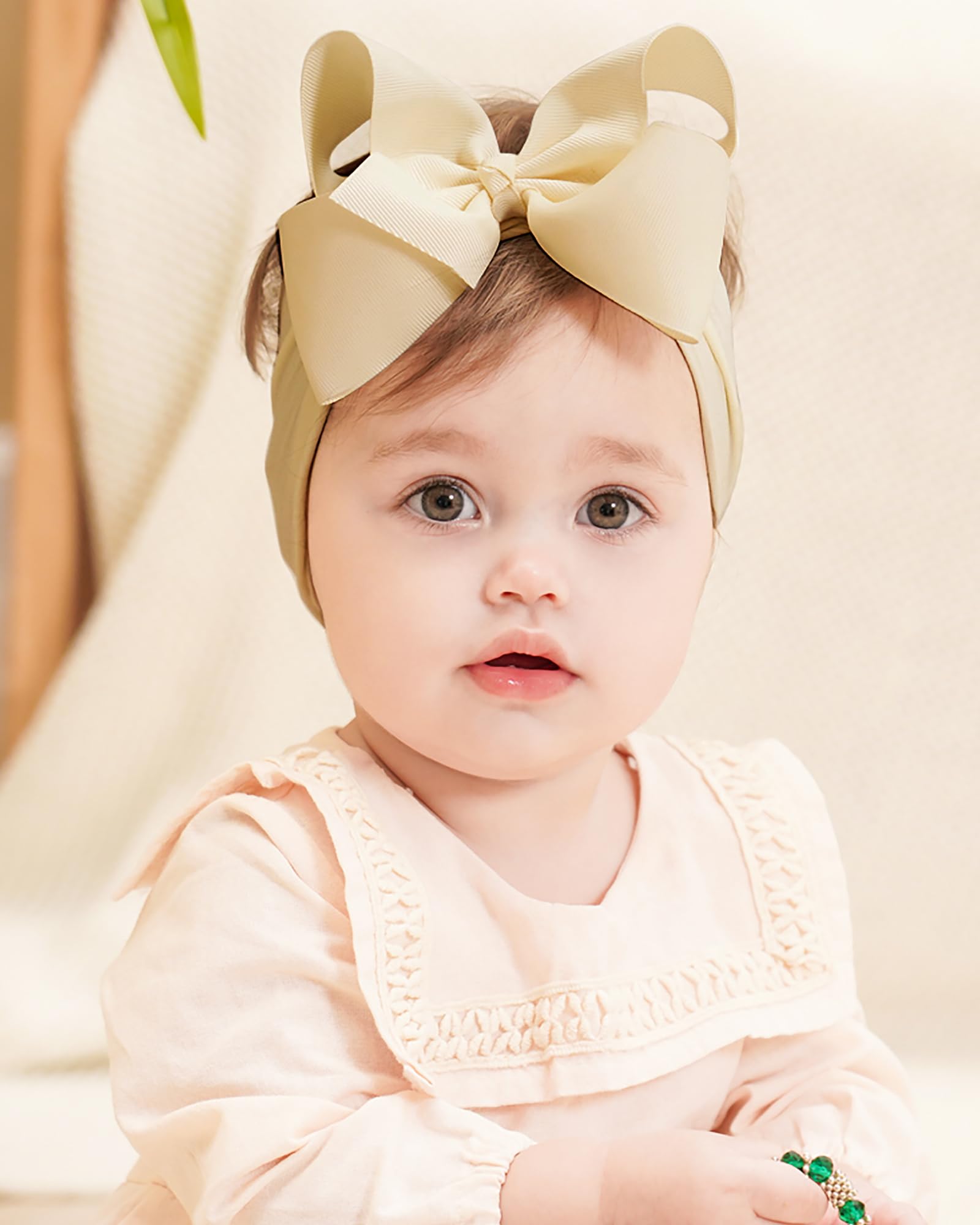 Doboi newborn to toddler fit nylon headband in use.