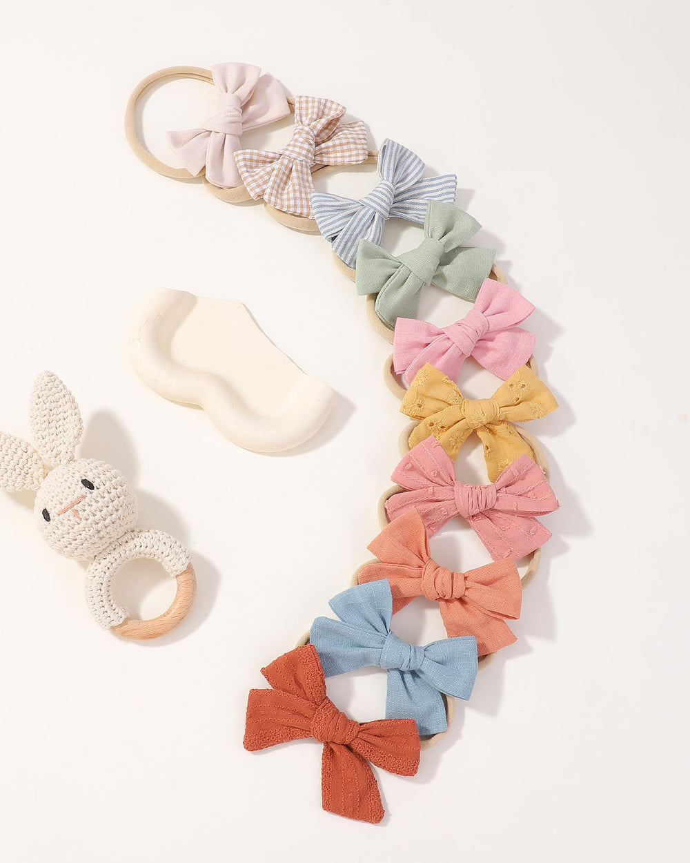 Doboi nude nylon headband blends with outfits for versatile styling.