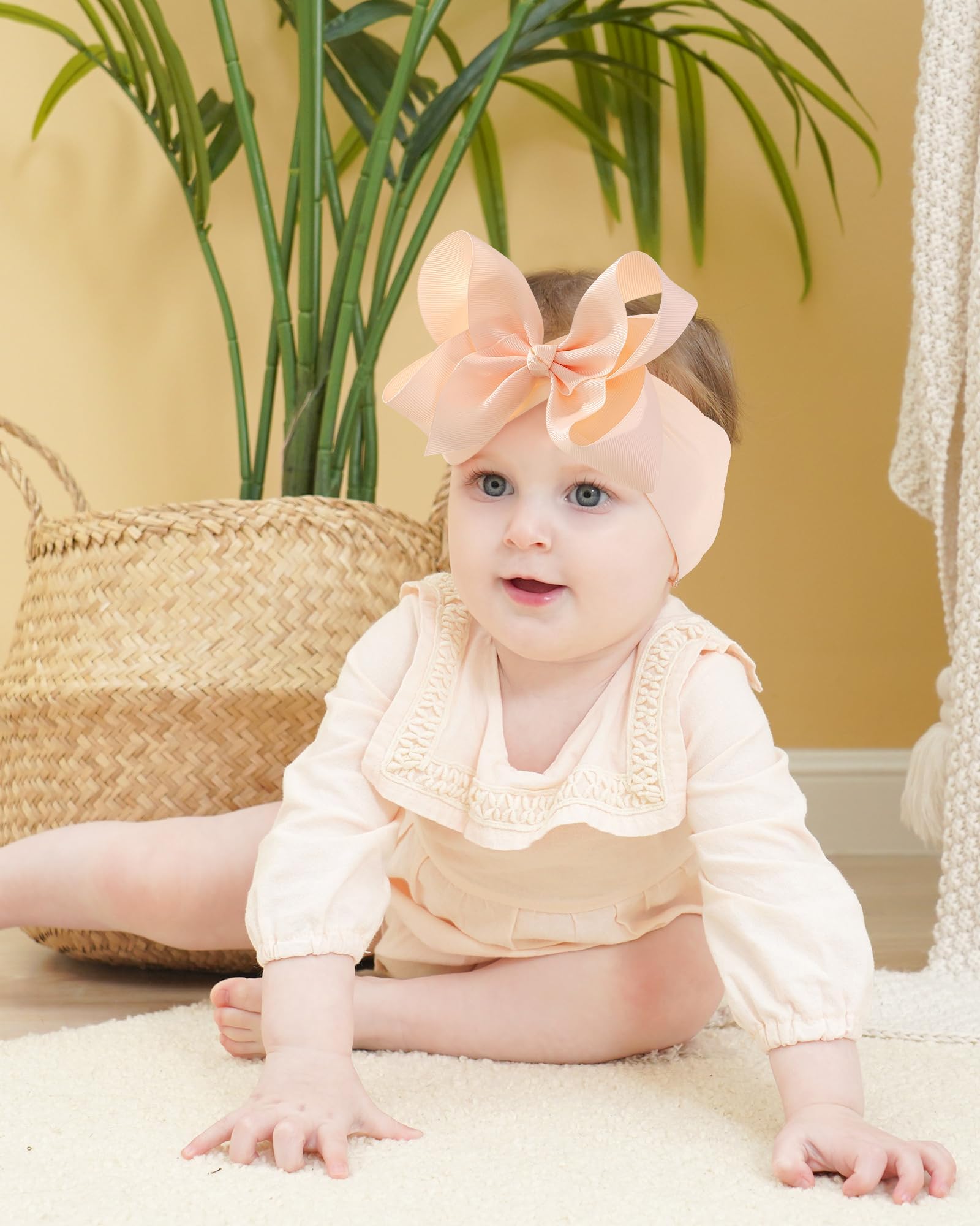 DOBOI newborn to toddler one-size headbands showing flexible fit