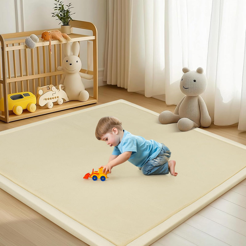 DoCred Baby Play Mat memory foam close-up shows plush coral velvet surface and cushioning.