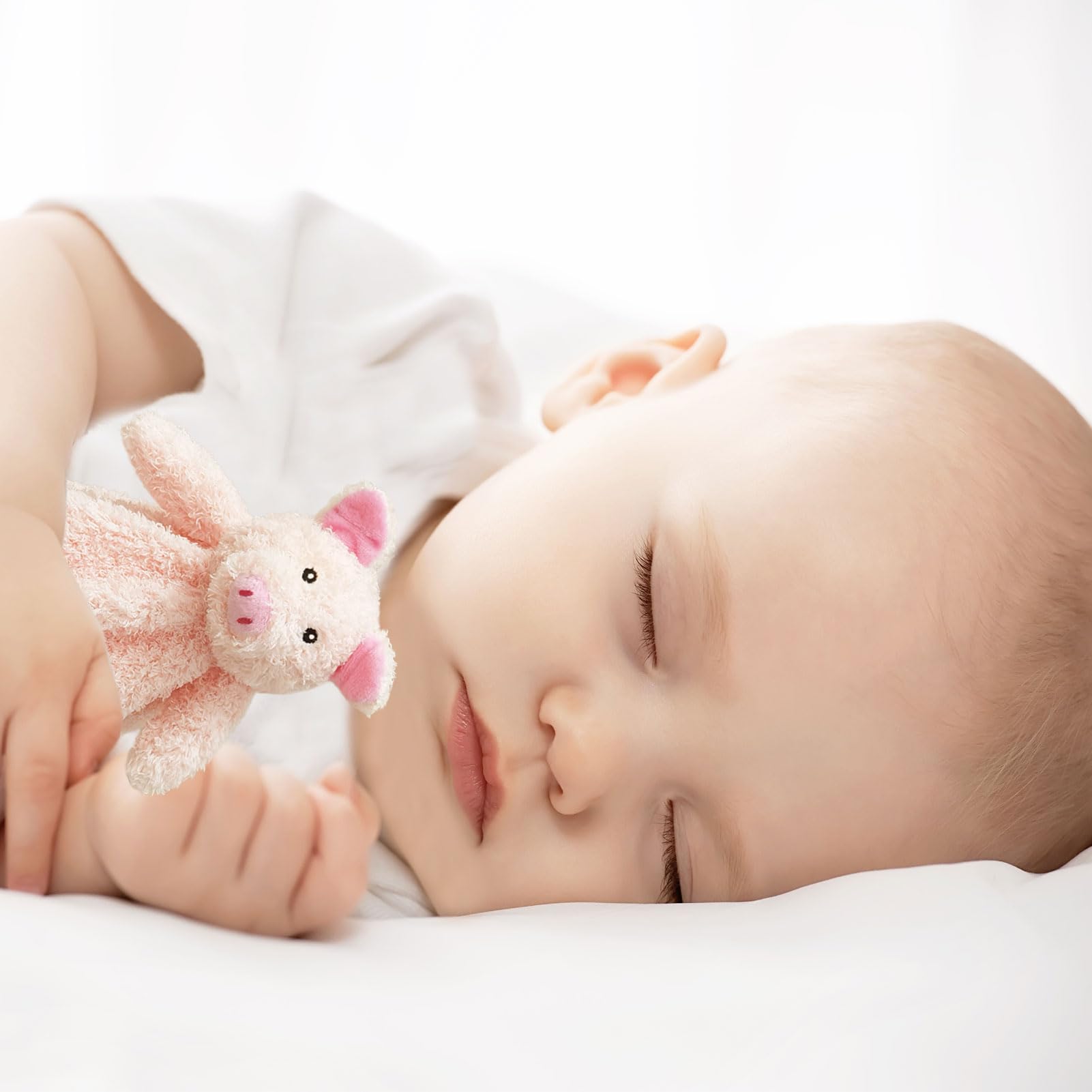 Doindute baby shower gift pig lovey shown as cuddly newborn friend