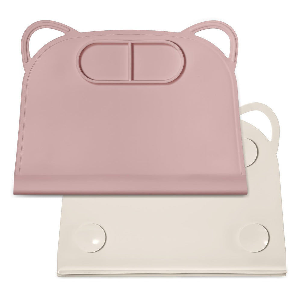 Domensi pink silicone suction placemat with teething edge, for mess-free dining.
